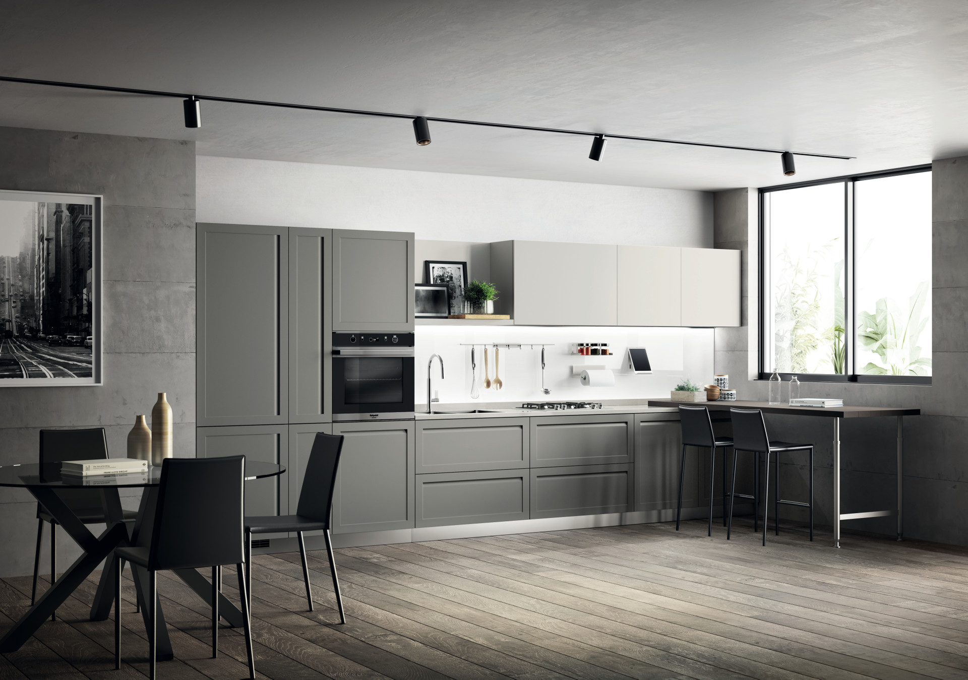 Scavolini Carattere: graue Küche mit Rahmenfronten in L-Form, Essplatz und schwarzen Industrial-Leuchten